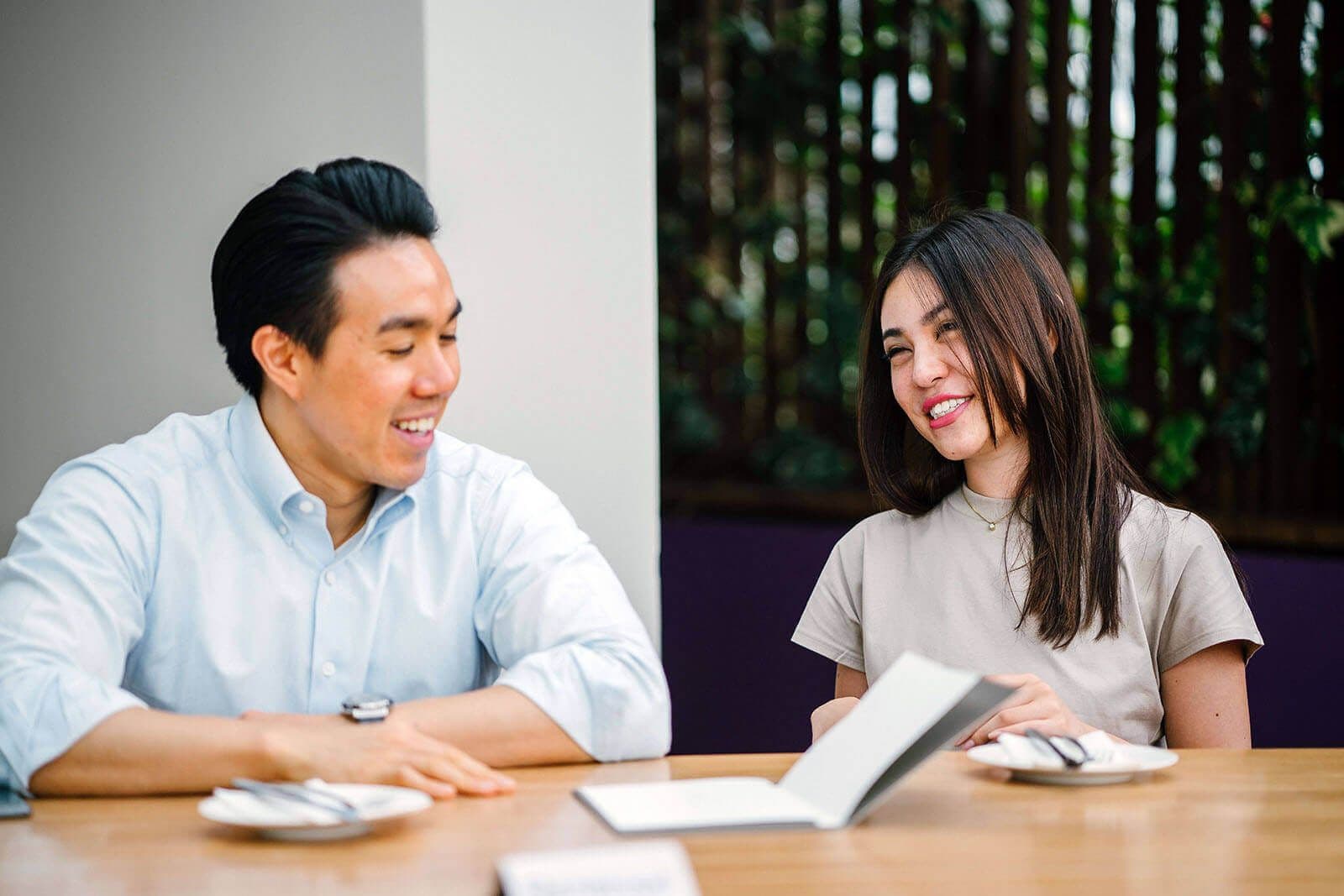 Two colleagues discussing upskilling plans