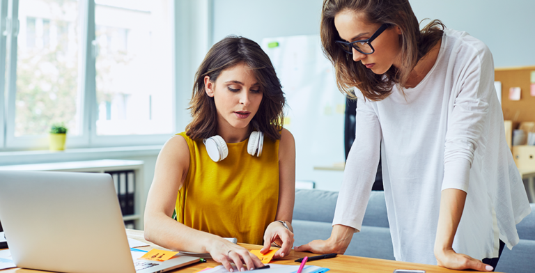 two-women-working-at-desk