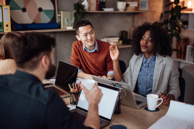 black Female leader talking to her employees