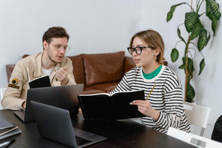 Man and a woman learning about leadership