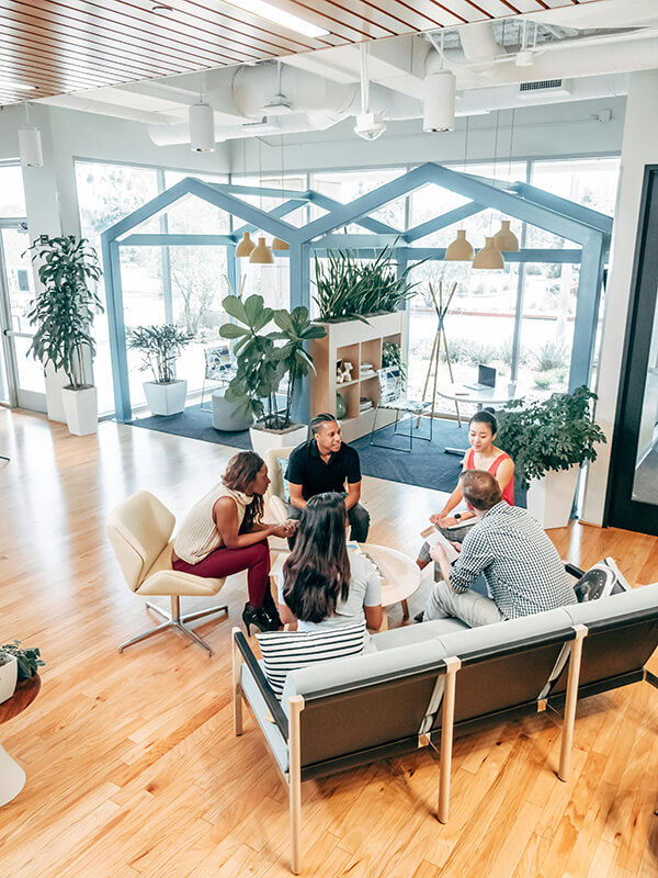 employees sitting in circle at BRG meeting