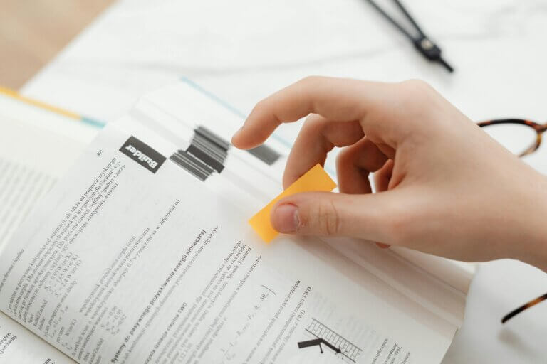 sticky note on textbook