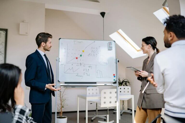 Colleagues attend a business meeting