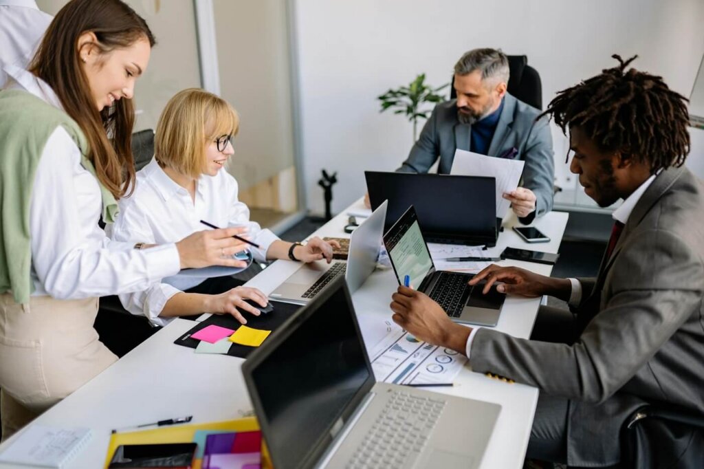 Diverse group of coworkers in a business meeting. Concept: change-ready organization.